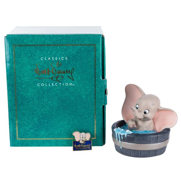 A WDCC "Dumbo " Member Gift Figurine and Pin.
