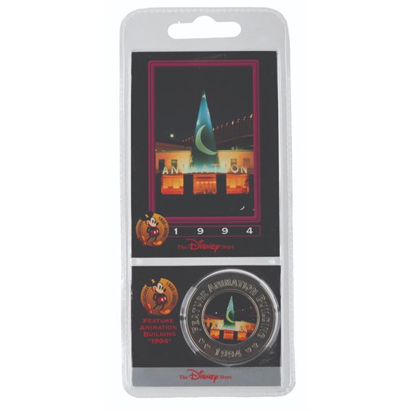 An Animation Building Disney Decades Commemorative Coin.