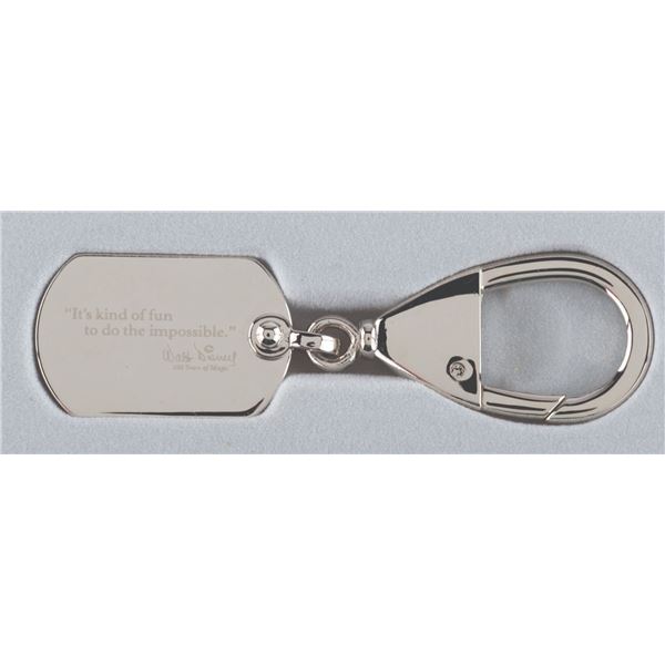 An Employee Exclusive Walt Disney Quote Keychain.