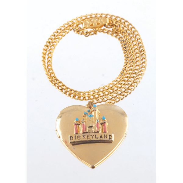 A Disneyland Sleeping Beauty Castle Heart-Shaped Locket.
