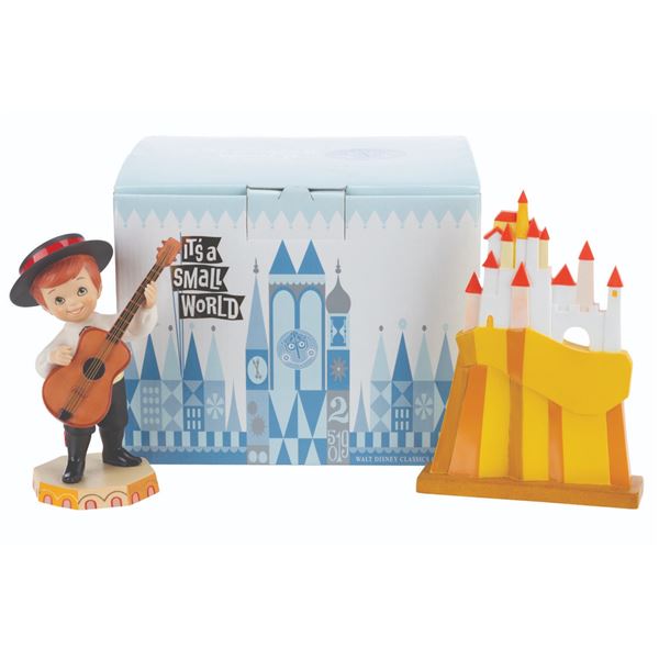 A WDCC It’s a Small World Figurine Set with Rolly Crump Signature.