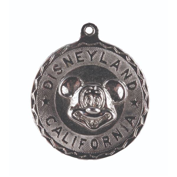 A Disneyland Mickey Mouse Charm.