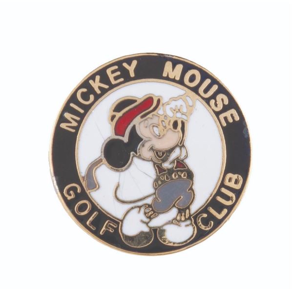 A Mickey Mouse Golf Club Ball Marker.