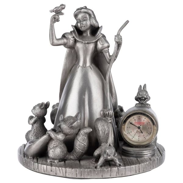 A "Snow White and the Seven Dwarfs " Pewter Figurine Clock.