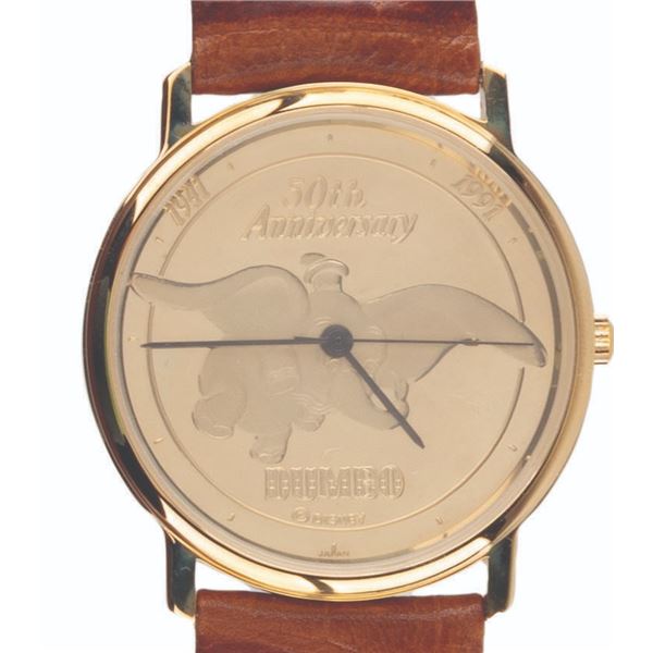 A Dumbo 50th Anniversary Gold-Plated Watch.