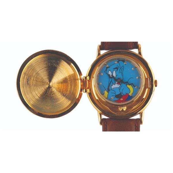 An  "Aladdin" Genie Pop-Up Watch with Lamp.