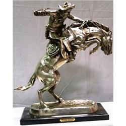 Silver "Bronco Buster" Remington