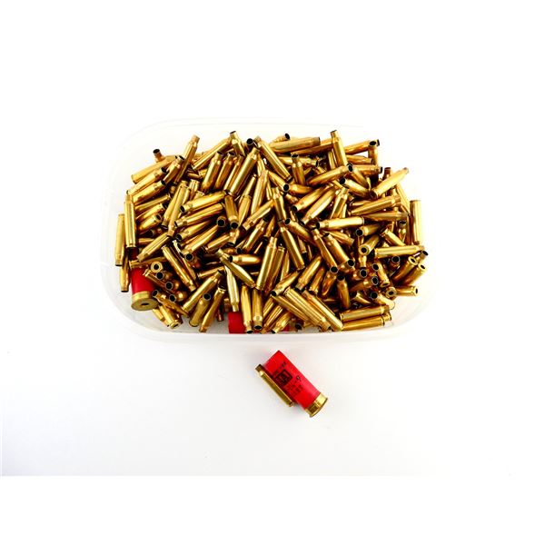 NON-PRIMED ASSORTED .223 REM BRASS CASES AND 12 GAUGE 2 3/4 SHOT SHELL HULLS LOT