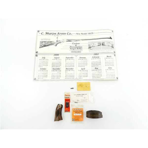 ASSORTED SCOPE / GUN PARTS AND WALL CALENDAR LOT