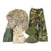Image 1 : ASSORTED CANADIAN / U.S. MILITARY COMBAT CLOTHING LOT