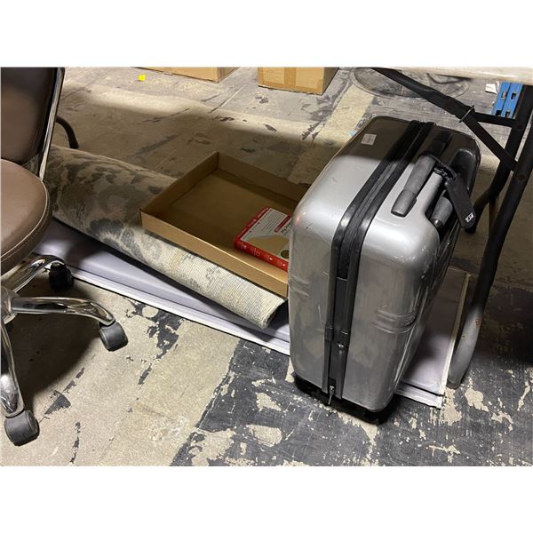 Tumi Grey Hardshell Luggage and Area Rug