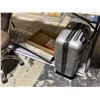 Image 1 : Tumi Grey Hardshell Luggage and Area Rug
