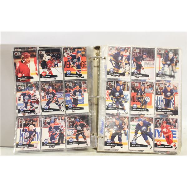 COLLECTOR BINDER FULL OF SPORTS CARDS
