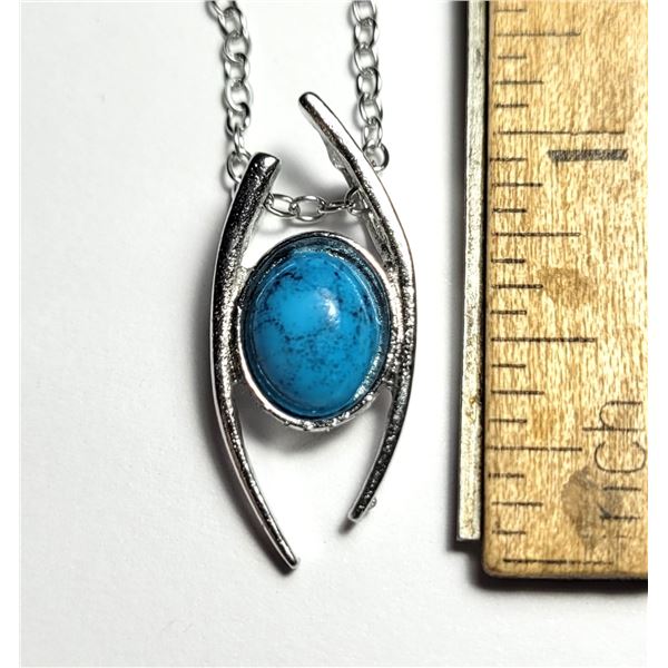 26)  SILVER TONE BEZEL SET OVAL