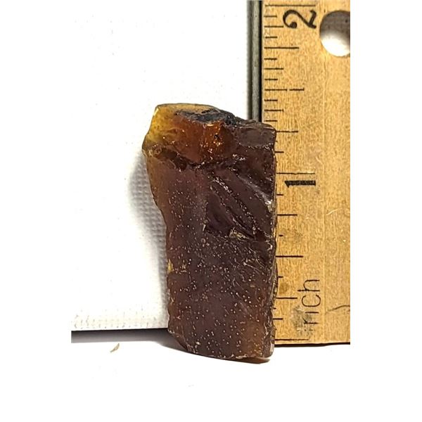 9)  NATURAL 4.8 GRAMS AMBER MINERAL