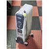 Image 1 : ETL OIL HEATER. TEMP ADJUSTABLE.