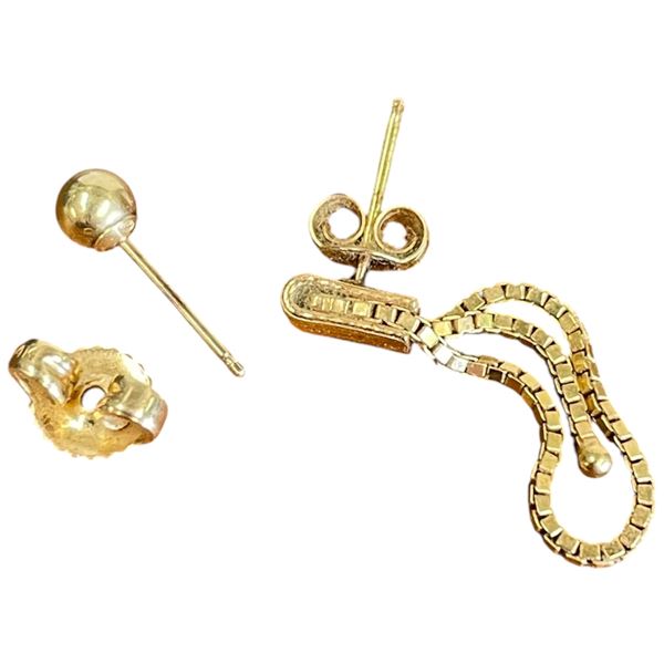 1.2 Grams of Scrap 14KT Gold - No stones ( 2 Single earrings with butterfly backs)