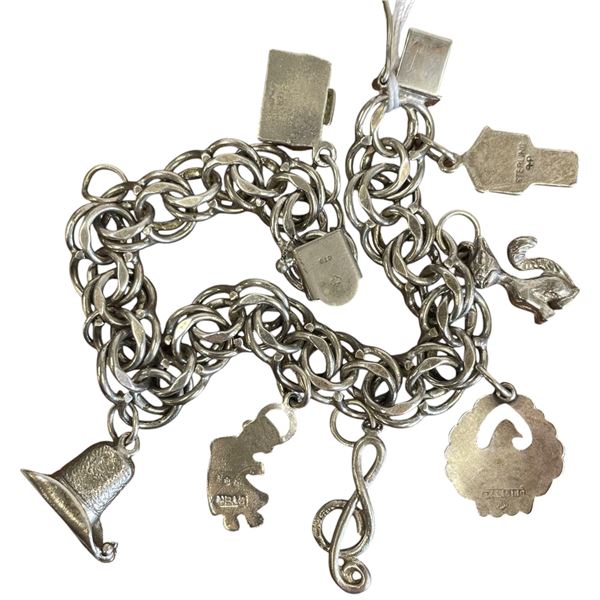 Sterling Silver Charm Bracelet with Sterling Charms (Total weight: 33.8 grams)
