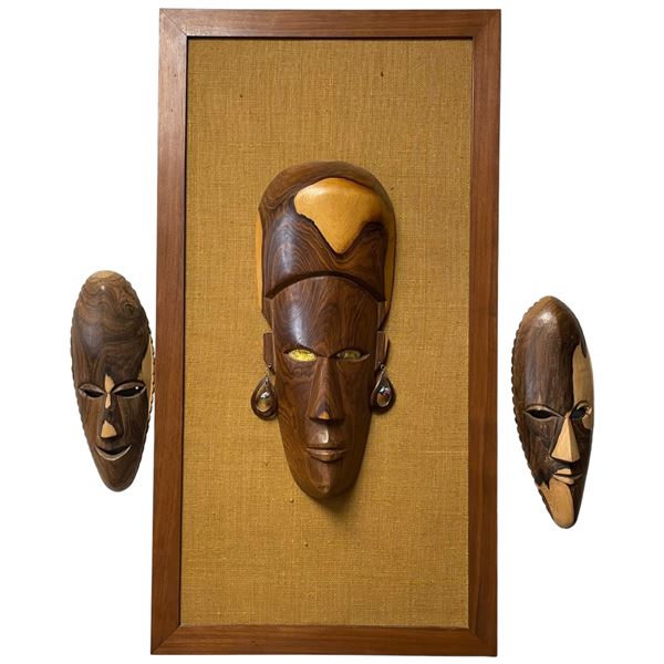 3 Piece Group of Carved Wood African Art - The  large framed piece is 19" x 34"