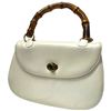 Image 1 : 1960s Mel-Ton Beige Structured Handbag with Faux Bamboo Handle (3" x 10" x 7" tall)