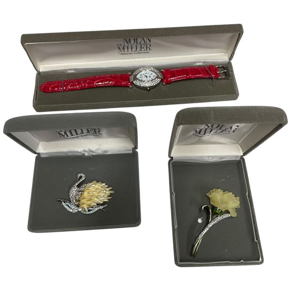 2 Nolan Miller Brooches and 1 Nolan Miller Red Watch - All in original cases