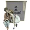 Image 1 : Retired 1995 Lladro Porcelain "Ten and Growing or First Kiss" (#7635) - 7.75" tall - Original Box