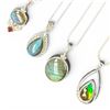 Image 1 : 3 Sterling Silver Labradorite & 1 Ammolite Necklace (The round Labrodorite is Sajen) Total weight: 3