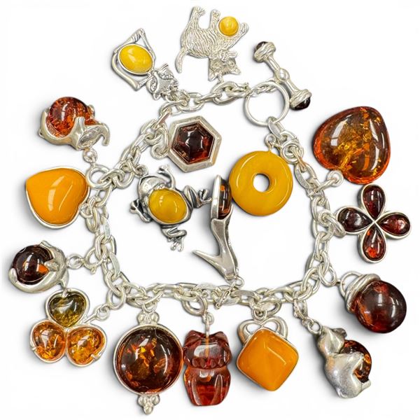 Sterling Silver Amber Resin Charm Bracelet (Many of the charms are on removable spring ring clasps) 