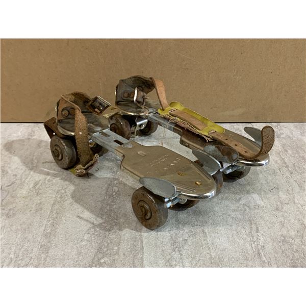 Vintage Dominon Metal Strap-On Roller Skates