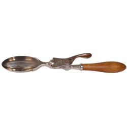 Ice cream scoop, United Products oval bowl, nickel plated brass w/wood handle, used for banana split