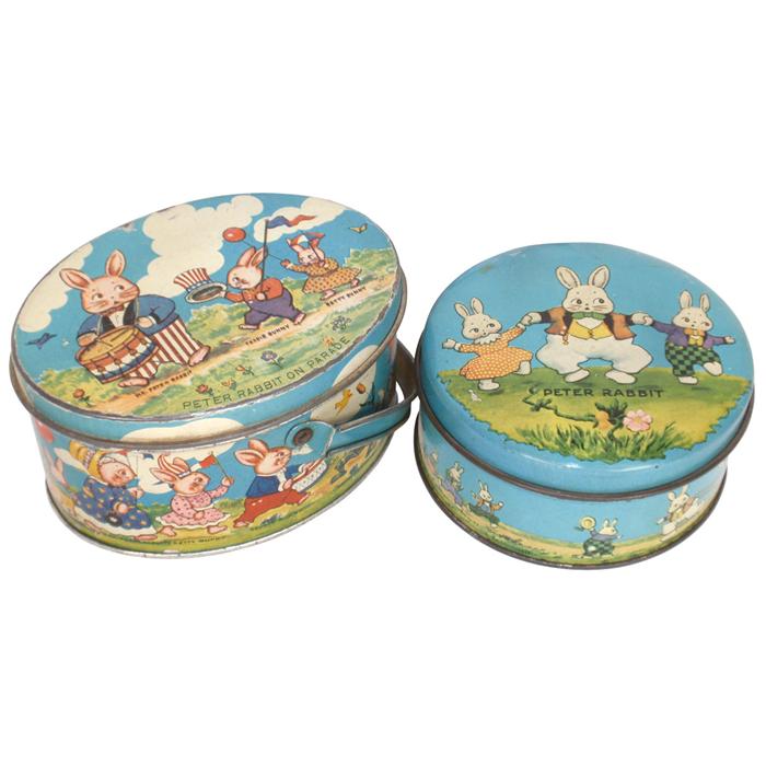 Child's Peter Rabbit candy tins (2), Peter Rabbit on Parade oval tin ...