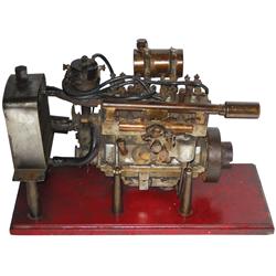 Working gas engine, 4 cyl overhead valve system, appears complete, no markings, turn the flywheel &