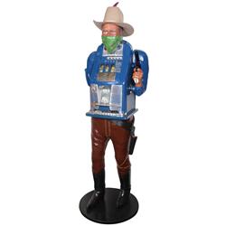 Coin-operated slot machine in Frank Polk type carved wooden "One-Armed Bandit" cowboy, holds 5 Cent 