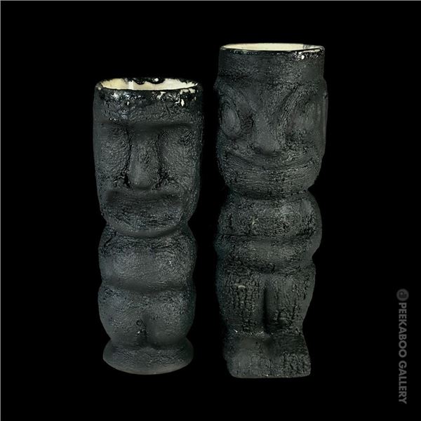 SET OF TWO (2) HOBBYIST LAVA  GLAZE VERSIONS OF TOBY DESIGNS MISSIONARY DOWNFALL NUI TIKI MUGS.