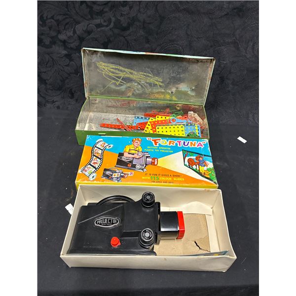 Vintage battery operated kids projector and metal tool box with mechanic
