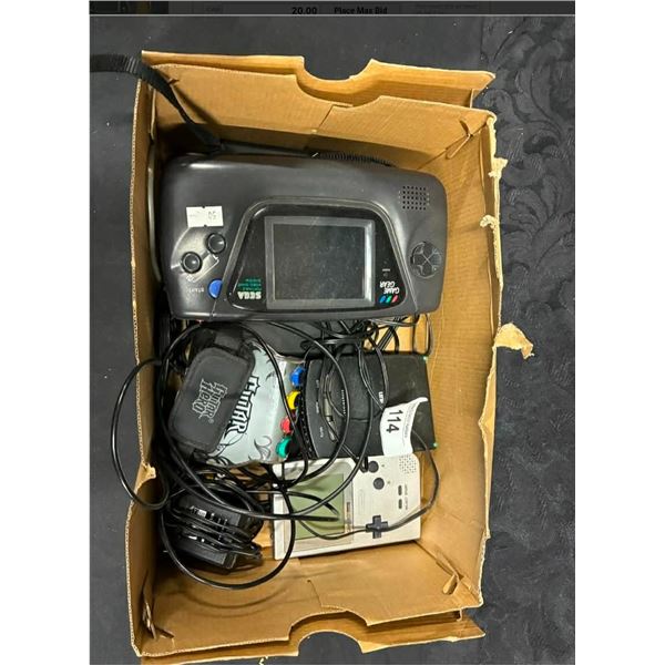 Vintage Sega game console, controllers, and games