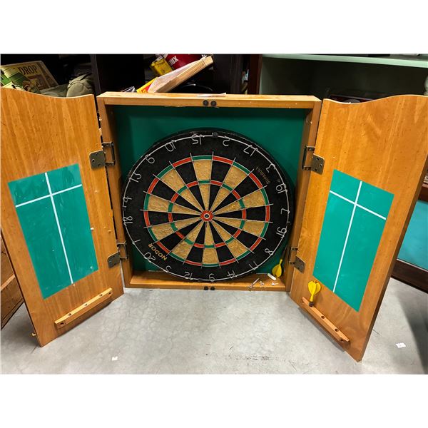 Dart board in cabinet, included darts!