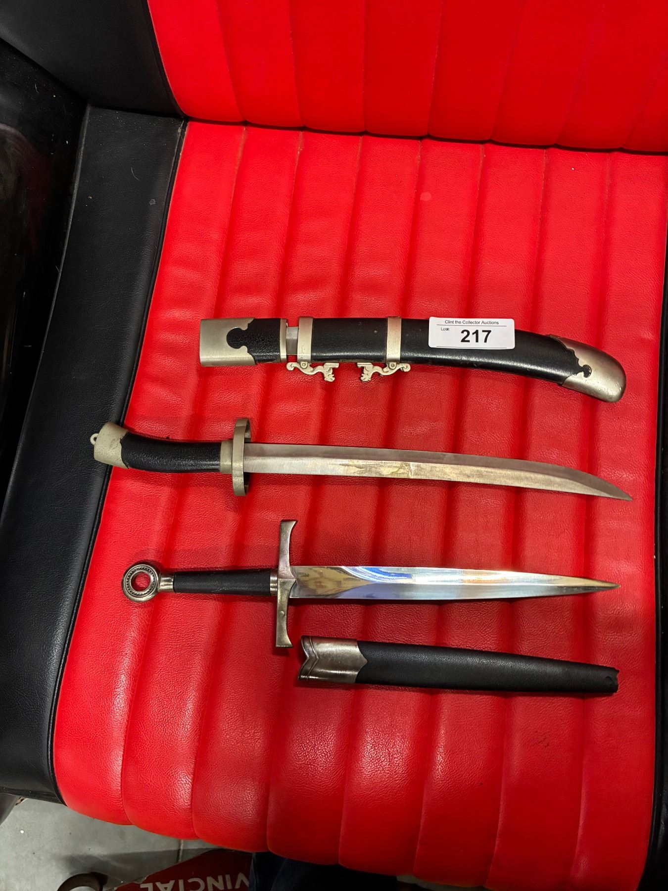 2 Daggers with sheath, 16