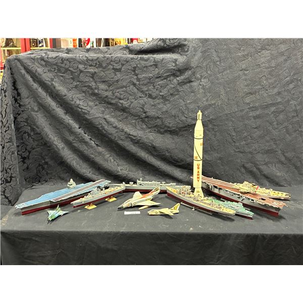 Large lot of various war ship and plane models including a rocket
