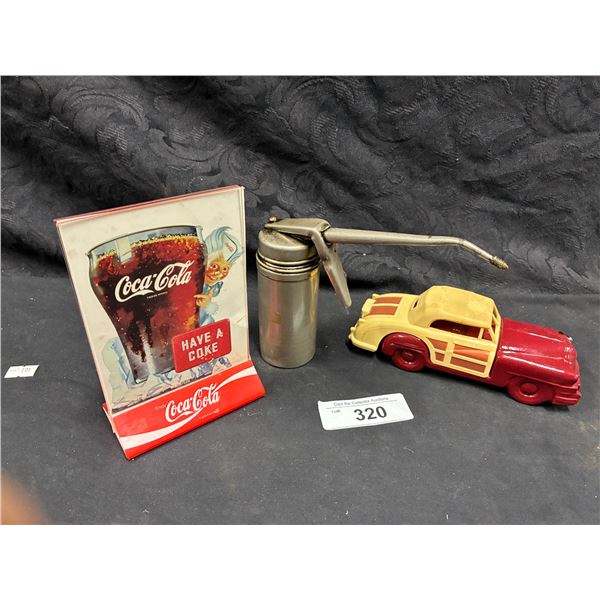 Vintage car bottle and Coke display with handed oiler