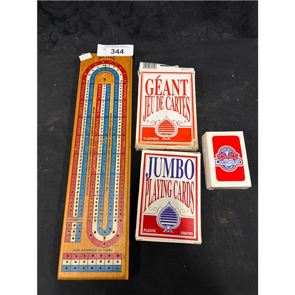 Vintage cribbage board with cards