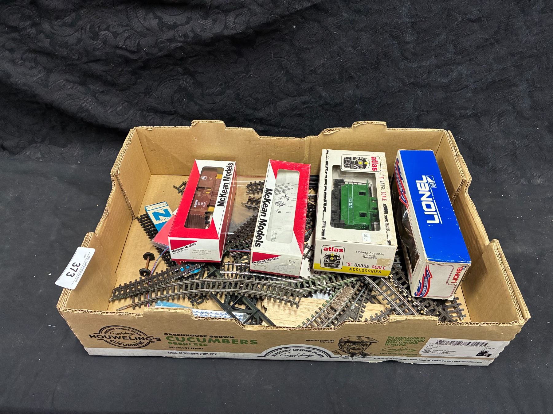 Collection of train tracks and train cars