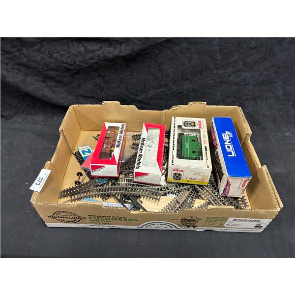 Collection of train tracks and train cars