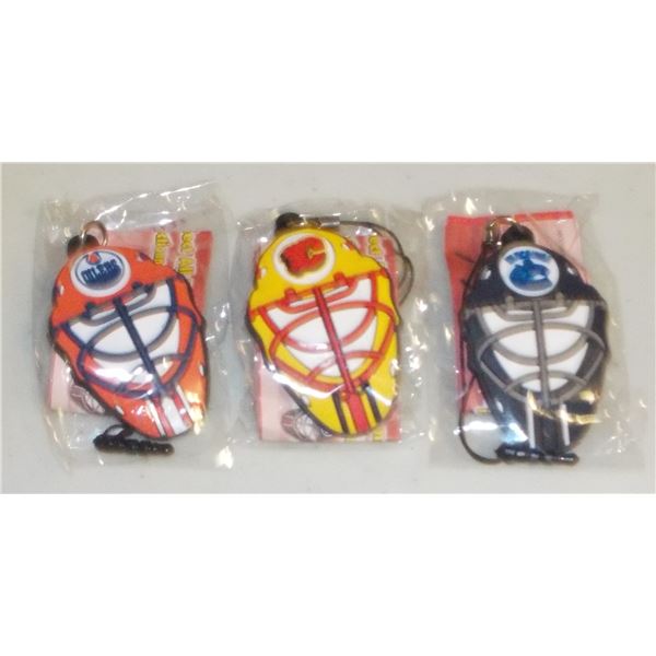 Lot of 3 NHL Keychains - Oilers Canucks & Flames