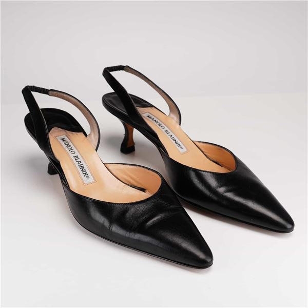 A Pair of Manolo Blahnik Carolyne Leather Slingback Black Pumps