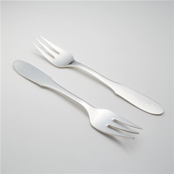 A Pair of Georg Jensen Denmark EPNS Mermaid Pattern Hammered Fish Forks