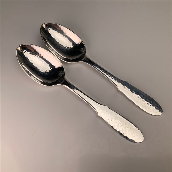 A Pair of Georg Jensen Mermaid Pattern Hammered Silverplate Place or Oval Soup Spoons