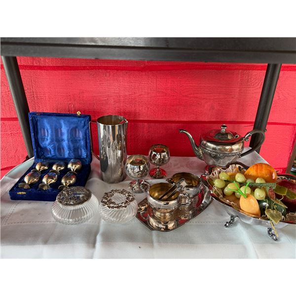 Silver plate, goblets, artificial fruit and vegetables