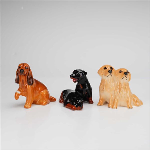 Three Beswick and Royal Doulton Bone China Dog Figurines