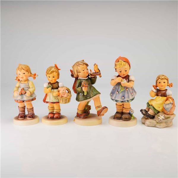 A Collection of Five Goebel M.I. Hummel Porcelain Figurines